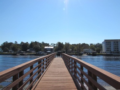 Turnkey Furnished Top-Floor End Unit with Golf Course  Waterway on Arrowhead Country Club in South Carolina - for sale on GolfHomes.com, golf home, golf lot
