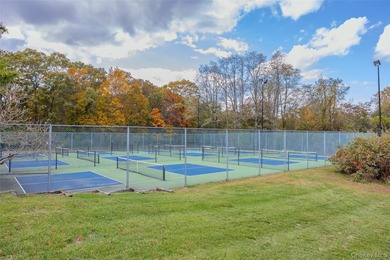 This tastefully remodeled townhome was designed with style and on Birchwood at Spring Lake in New York - for sale on GolfHomes.com, golf home, golf lot