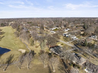 Awesome mid-century ranch w/full walk-out lower level. Overlooks on Mauh-Nah-Tee-See Country Club in Illinois - for sale on GolfHomes.com, golf home, golf lot