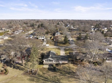 Awesome mid-century ranch w/full walk-out lower level. Overlooks on Mauh-Nah-Tee-See Country Club in Illinois - for sale on GolfHomes.com, golf home, golf lot