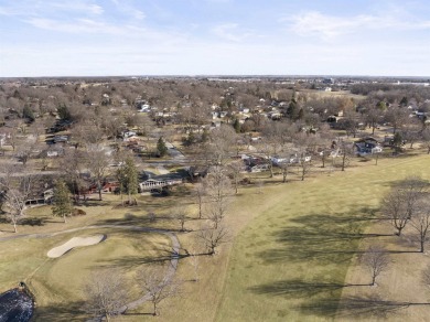 Awesome mid-century ranch w/full walk-out lower level. Overlooks on Mauh-Nah-Tee-See Country Club in Illinois - for sale on GolfHomes.com, golf home, golf lot