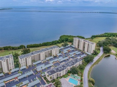 Step into one of Cove Cay's most coveted finds--an oversized on Cove Cay Country Club in Florida - for sale on GolfHomes.com, golf home, golf lot