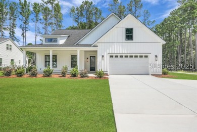 Set on nearly half an acre, this 3 bedroom, 2.5 bath home on Hampton Pointe Golf Course in South Carolina - for sale on GolfHomes.com, golf home, golf lot
