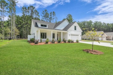 Set on nearly half an acre, this 3 bedroom, 2.5 bath home on Hampton Pointe Golf Course in South Carolina - for sale on GolfHomes.com, golf home, golf lot