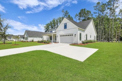 Set on nearly half an acre, this 3 bedroom, 2.5 bath home on Hampton Pointe Golf Course in South Carolina - for sale on GolfHomes.com, golf home, golf lot