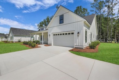 Set on nearly half an acre, this 3 bedroom, 2.5 bath home on Hampton Pointe Golf Course in South Carolina - for sale on GolfHomes.com, golf home, golf lot