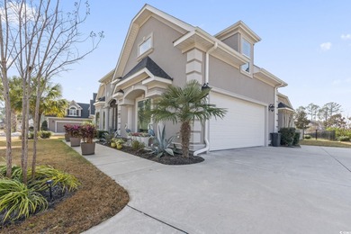 Welcome to this stunning custom-built 2021 stucco home on Wild Wing Plantation in South Carolina - for sale on GolfHomes.com, golf home, golf lot