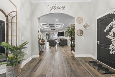 Welcome to this stunning custom-built 2021 stucco home on Wild Wing Plantation in South Carolina - for sale on GolfHomes.com, golf home, golf lot