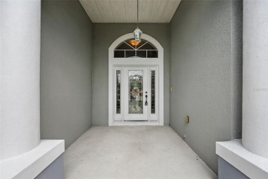 One or more photo(s) has been virtually staged. Live the Florida on Oaks National Golf Course in Florida - for sale on GolfHomes.com, golf home, golf lot