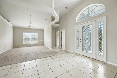 One or more photo(s) has been virtually staged. Live the Florida on Oaks National Golf Course in Florida - for sale on GolfHomes.com, golf home, golf lot
