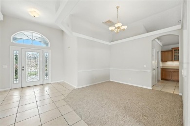 One or more photo(s) has been virtually staged. Live the Florida on Oaks National Golf Course in Florida - for sale on GolfHomes.com, golf home, golf lot