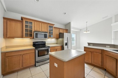 One or more photo(s) has been virtually staged. Live the Florida on Oaks National Golf Course in Florida - for sale on GolfHomes.com, golf home, golf lot