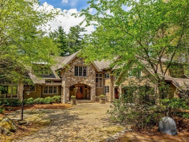 Overlooking the scenic 4th hole, this stunning 4-bedroom, 4 on Lake Toxaway Country Club in North Carolina - for sale on GolfHomes.com, golf home, golf lot
