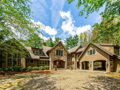 Overlooking the scenic 4th hole, this stunning 4-bedroom, 4 on Lake Toxaway Country Club in North Carolina - for sale on GolfHomes.com, golf home, golf lot