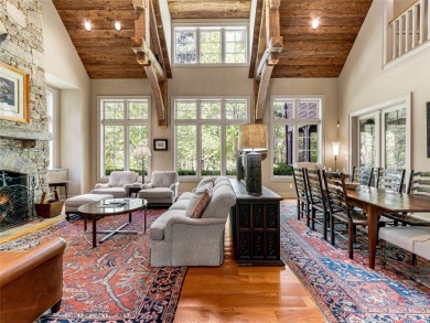 Overlooking the scenic 4th hole, this stunning 4-bedroom, 4 on Lake Toxaway Country Club in North Carolina - for sale on GolfHomes.com, golf home, golf lot