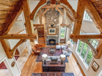 Overlooking the scenic 4th hole, this stunning 4-bedroom, 4 on Lake Toxaway Country Club in North Carolina - for sale on GolfHomes.com, golf home, golf lot