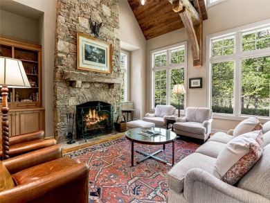 Overlooking the scenic 4th hole, this stunning 4-bedroom, 4 on Lake Toxaway Country Club in North Carolina - for sale on GolfHomes.com, golf home, golf lot