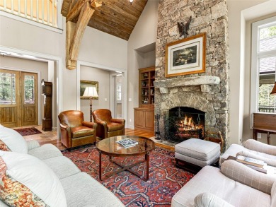 Overlooking the scenic 4th hole, this stunning 4-bedroom, 4 on Lake Toxaway Country Club in North Carolina - for sale on GolfHomes.com, golf home, golf lot