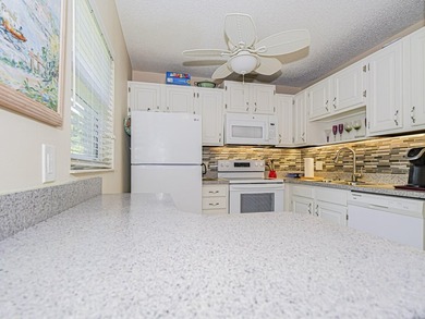 First Floor, BEST location --directly across from the clubhouse on Vero Beach South Golf Course in Florida - for sale on GolfHomes.com, golf home, golf lot