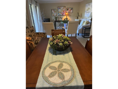 Lots of natural light streams into this cheerful beach retreat on Seascape Golf Course in Florida - for sale on GolfHomes.com, golf home, golf lot