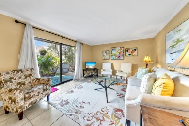 Lots of natural light streams into this cheerful beach retreat on Seascape Golf Course in Florida - for sale on GolfHomes.com, golf home, golf lot