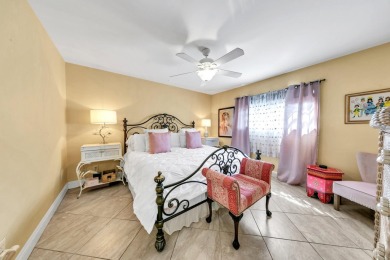 Lots of natural light streams into this cheerful beach retreat on Seascape Golf Course in Florida - for sale on GolfHomes.com, golf home, golf lot