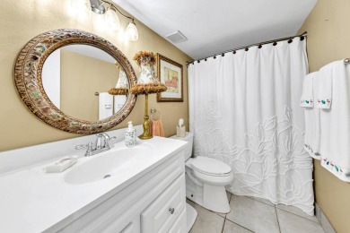 Lots of natural light streams into this cheerful beach retreat on Seascape Golf Course in Florida - for sale on GolfHomes.com, golf home, golf lot