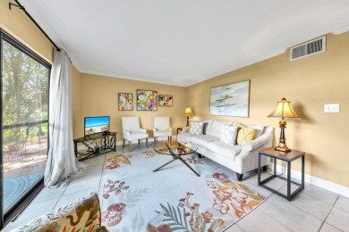 Lots of natural light streams into this cheerful beach retreat on Seascape Golf Course in Florida - for sale on GolfHomes.com, golf home, golf lot