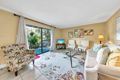 Lots of natural light streams into this cheerful beach retreat on Seascape Golf Course in Florida - for sale on GolfHomes.com, golf home, golf lot