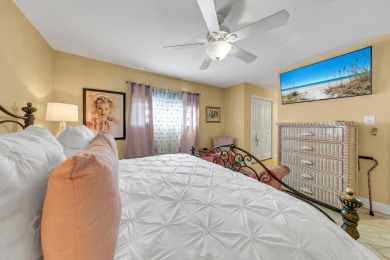 Lots of natural light streams into this cheerful beach retreat on Seascape Golf Course in Florida - for sale on GolfHomes.com, golf home, golf lot