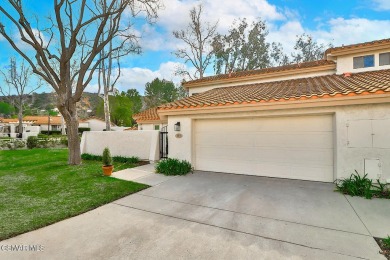 Discover refined living in this end unit gated townhome in Los on Los Robles Greens Golf Course in California - for sale on GolfHomes.com, golf home, golf lot