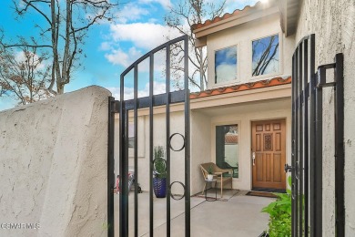 Discover refined living in this end unit gated townhome in Los on Los Robles Greens Golf Course in California - for sale on GolfHomes.com, golf home, golf lot