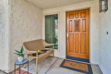 Discover refined living in this end unit gated townhome in Los on Los Robles Greens Golf Course in California - for sale on GolfHomes.com, golf home, golf lot