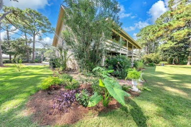 Lots of natural light streams into this cheerful beach retreat on Seascape Golf Course in Florida - for sale on GolfHomes.com, golf home, golf lot