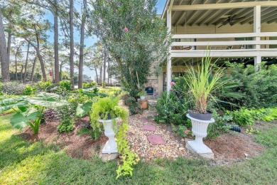 Lots of natural light streams into this cheerful beach retreat on Seascape Golf Course in Florida - for sale on GolfHomes.com, golf home, golf lot