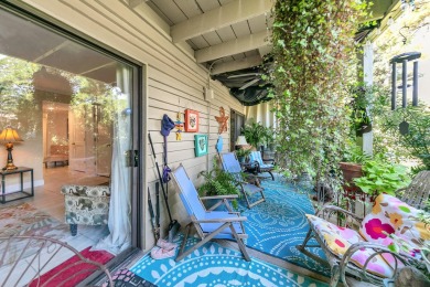 Lots of natural light streams into this cheerful beach retreat on Seascape Golf Course in Florida - for sale on GolfHomes.com, golf home, golf lot
