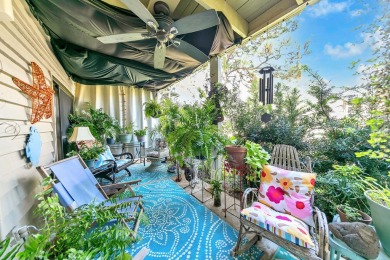 Lots of natural light streams into this cheerful beach retreat on Seascape Golf Course in Florida - for sale on GolfHomes.com, golf home, golf lot