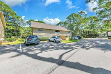 Lots of natural light streams into this cheerful beach retreat on Seascape Golf Course in Florida - for sale on GolfHomes.com, golf home, golf lot