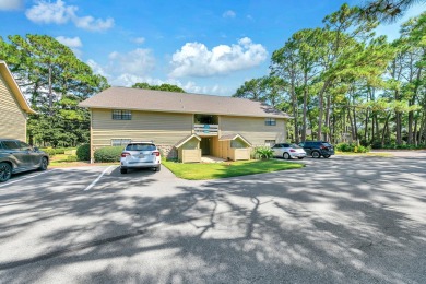 Lots of natural light streams into this cheerful beach retreat on Seascape Golf Course in Florida - for sale on GolfHomes.com, golf home, golf lot