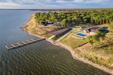 Exceptional waterfront lot in a prestigious gated community! on Cedar Creek Country Club in Texas - for sale on GolfHomes.com, golf home, golf lot
