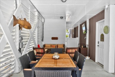 Charming coastal cottage with all the elements for full time on Sea Trail Golf Resort in North Carolina - for sale on GolfHomes.com, golf home, golf lot