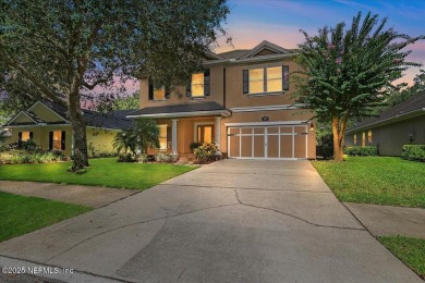 Outdoors is where you'll truly live in this gorgeous pool home on St. Johns Golf and Country Club in Florida - for sale on GolfHomes.com, golf home, golf lot