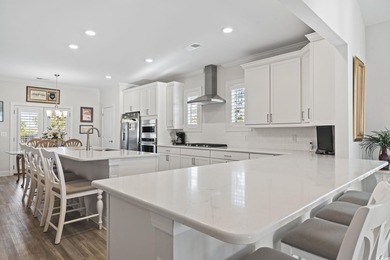 Welcome to this exceptional 5-bedroom, 3-bathroom corner-lot on Surf Golf and Beach Club in South Carolina - for sale on GolfHomes.com, golf home, golf lot