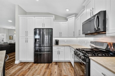 ABSOLUTELY STUNNING, COMPLETELY RENOVATED, 3/2 BLOCK and STUCCO on The Links of Spruce Creek in Florida - for sale on GolfHomes.com, golf home, golf lot