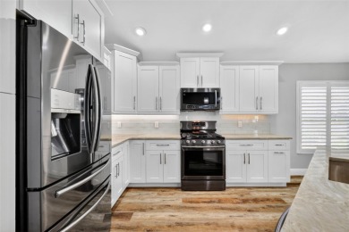 ABSOLUTELY STUNNING, COMPLETELY RENOVATED, 3/2 BLOCK and STUCCO on The Links of Spruce Creek in Florida - for sale on GolfHomes.com, golf home, golf lot