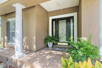 Outdoors is where you'll truly live in this gorgeous pool home on St. Johns Golf and Country Club in Florida - for sale on GolfHomes.com, golf home, golf lot
