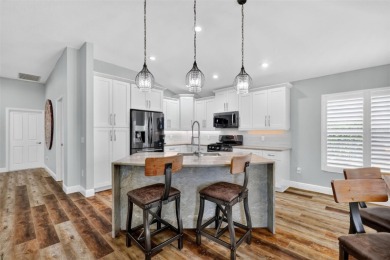 ABSOLUTELY STUNNING, COMPLETELY RENOVATED, 3/2 BLOCK and STUCCO on The Links of Spruce Creek in Florida - for sale on GolfHomes.com, golf home, golf lot