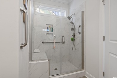 Welcome to this exceptional 5-bedroom, 3-bathroom corner-lot on Surf Golf and Beach Club in South Carolina - for sale on GolfHomes.com, golf home, golf lot