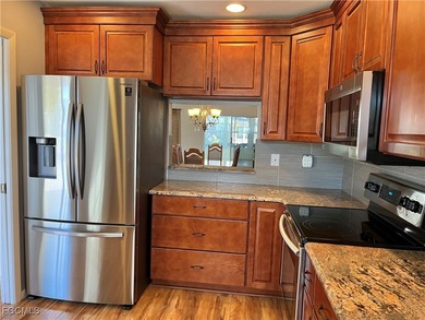 This spacious 3 bedroom unit features a gorgeous updated kitchen on Myerlee Country Club in Florida - for sale on GolfHomes.com, golf home, golf lot