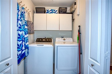 Turnkey, Top-Floor Veranda with Signature Golf & Water Views on Heritage Palms Golf and Country Club in Florida - for sale on GolfHomes.com, golf home, golf lot